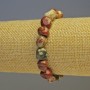 Bracelet with Red Jasper Faceted Beads with Geode Inclusions, bead diameters 11x11 mm ±, 9x9 mm ±, length 18 cm stretch