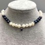 Choker in black and white oval freshwater pearls, 8x6-7 mm, with pendant, length about 38 cm, with clasp and extender chain