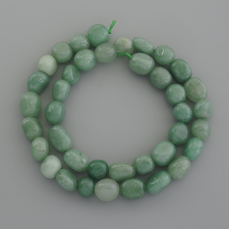 Nephrite beads, faceted, diameter 10–12x10 mm ±, length 39 cm ±