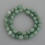 Nephrite beads, faceted, diameter 10–12x10 mm ±, length 39 cm ±
