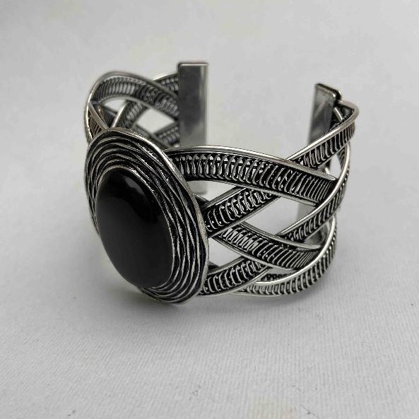 Discounted bracelet black Agate with wide metal bar bezel and delicate oval pattern