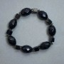 Bracelet with imitation agate cube 6mm, faceted bead 16x12mm, smoky topaz rondelle 6x3mm, length 18mm, stretch