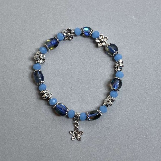 Assortment Bracelet with Faceted Rondelles 6x5mm+- galvanic plating 9x7mm+- with metal inserts, length 18mm+- stretch