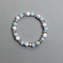 Bracelet 'Assorti' Faceted Rondelles 8x6 mm +/- Bead 8 mm +/- with Metal Inserts, Length 18 mm +/- Stretch