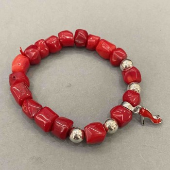Faceted Coral Bracelet, bead diameter 8–10×10 mm ±, with metal inlays, stretch band, length 18 mm ±