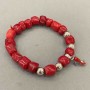 Faceted Coral Bracelet, bead diameter 8–10×10 mm ±, with metal inlays, stretch band, length 18 mm ±