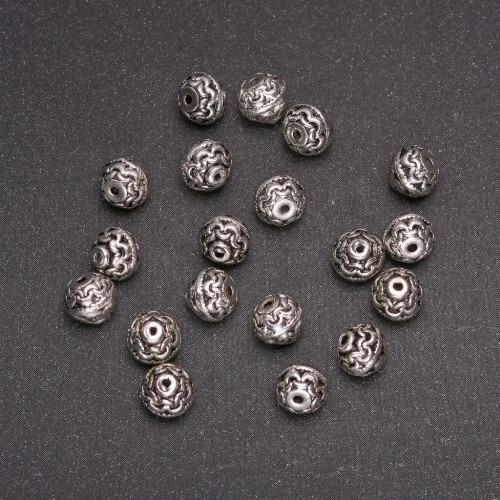 Bead-insert findings, 7 mm diameter, inner diameter 1.4 mm, packaging 20 g, (+-) 20 pcs