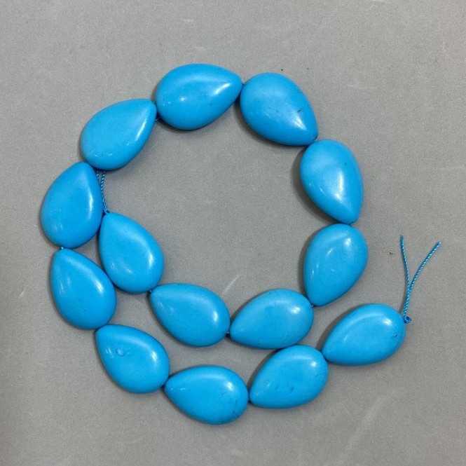 Turquoise pressed teardrop beads, diameter 28x19 mm, length 40 cm +-