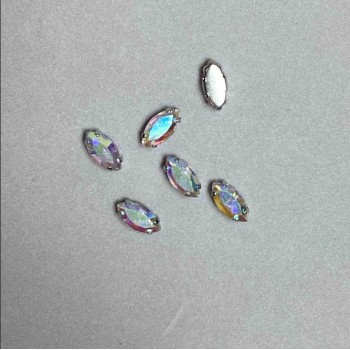 Price per pack /10 pcs. Sew-on crystal in a prong setting oval 10×4.5 mm ± yellow and magenta
