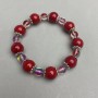 Bracelet with coral imitation beads 12mm +/- and opal glass beads 8mm +/- with metal inlays, length 18 cm (stretch)