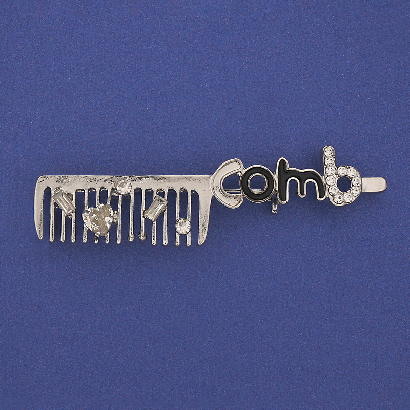 Brooch 'Comb' with white crystals on silver-tone metal 60x12mm+