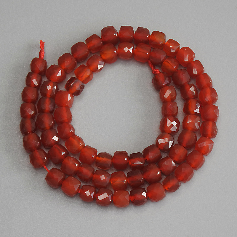 Carnelian beads, faceted cube 5x5 mm ± on thread, length 37 cm+