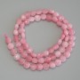 Beads tinted quartz Tourmaline imitation. Faceted coin-shaped beads, 6mm diameter, 39cm length on thread