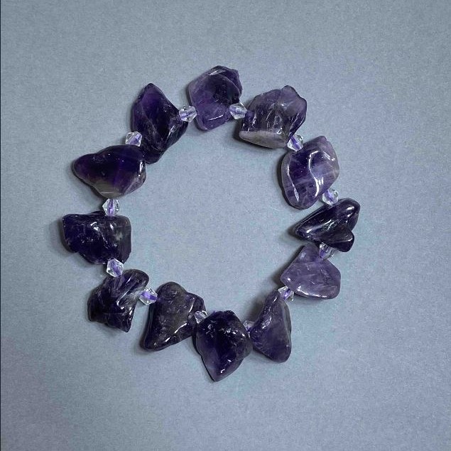 Amethyst Faceted Bracelet 20-23x15mm ± Mountain Crystal Bicones 5x5mm ±, length 18cm ± stretch