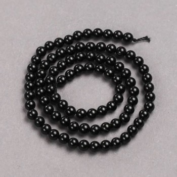 Beads on a cord of natural stone — Black Tourmaline, smooth round beads, diameter 4–5 mm, length 39 cm