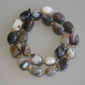 Botswana Agate Beads, natural stone, faceted, diameter 14-16×11 mm ±, 3 mm seed beads ±, length about 41 cm ± on thread