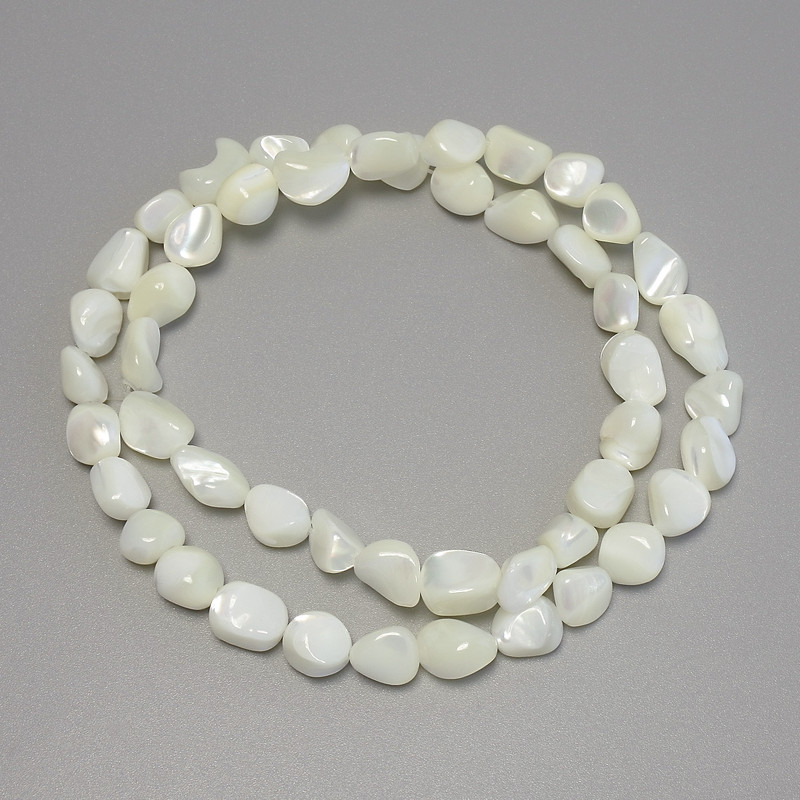Mother-of-Pearl Faceted Beads, 9x7 mm, approx. 40 cm on thread