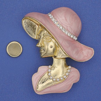 Magnetic brooch 'Girl in a Hat' with white crystals, pink enamel, golden metal 53x45mm+