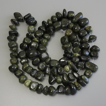 Dragon Skin beads, pressed faceted 10-15×5-10 mm, 74 cm long on thread