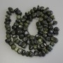 Dragon Skin beads, pressed faceted 10-15×5-10 mm, 74 cm long on thread