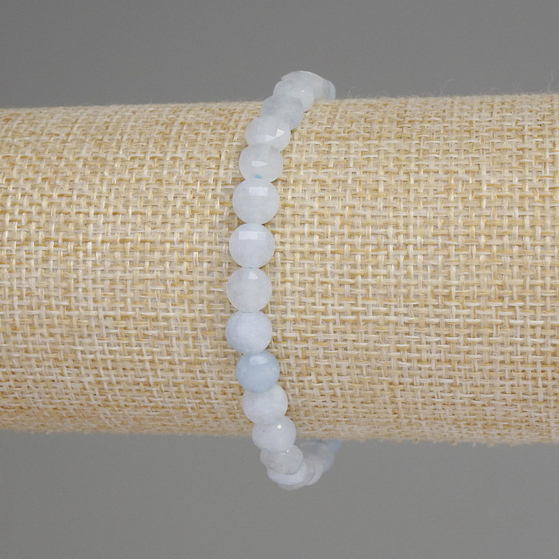 Aquamarine bracelet with faceted coins, 6 mm diameter, 18 mm length, stretch