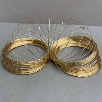 Memory wire gold-colored, 0.8 mm thick, coil diameter about 6 cm (+/-) price per 100 g