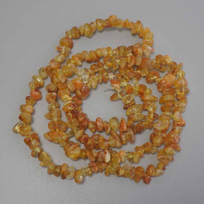Citrine chip beads, diameter 6-10×3-7 mm, length 78 cm on a thread