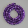 Sugilite beads faceted cubes, about 5.5 mm in diameter, on thread, length 37 cm