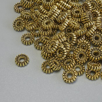 Gold-colored metal bead inserts, size 6x2 mm, hole diameter 2 mm ±, packaging 20 g (~109 pcs)
