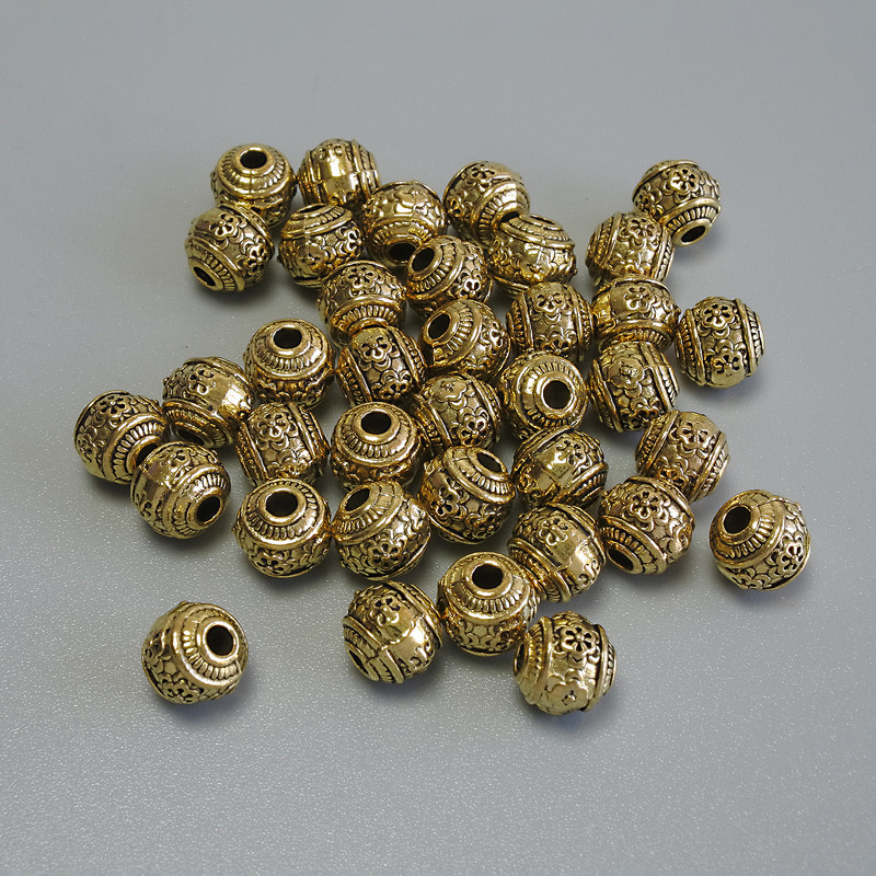 Gold-tone bead insert findings, diameter 5×6 mm ± bore diameter approx 1.9 mm, packaging 20 g (~39 pcs)