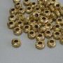 Gold-tone bead insert finding, 6×3 mm diameter with approximately 3 mm hole, packaging 20 g (~56 pcs)