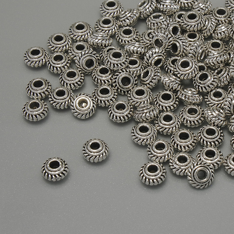 Bead insert findings, color: silver, diameter 5x3 mm ± hole diameter 1.7 mm ±, packaging 20 g (~99 pcs).
