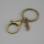 Price per pack /10 pcs. Base for keychain with two attachments: carabiner 33×24 mm and ring, diameter 3 cm, length 7 cm