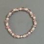 Bracelet with Czech crystal rondelles, diameter 8x6 mm, imitation pearl bead 6 mm, with metal inserts, elastic length about 18 mm