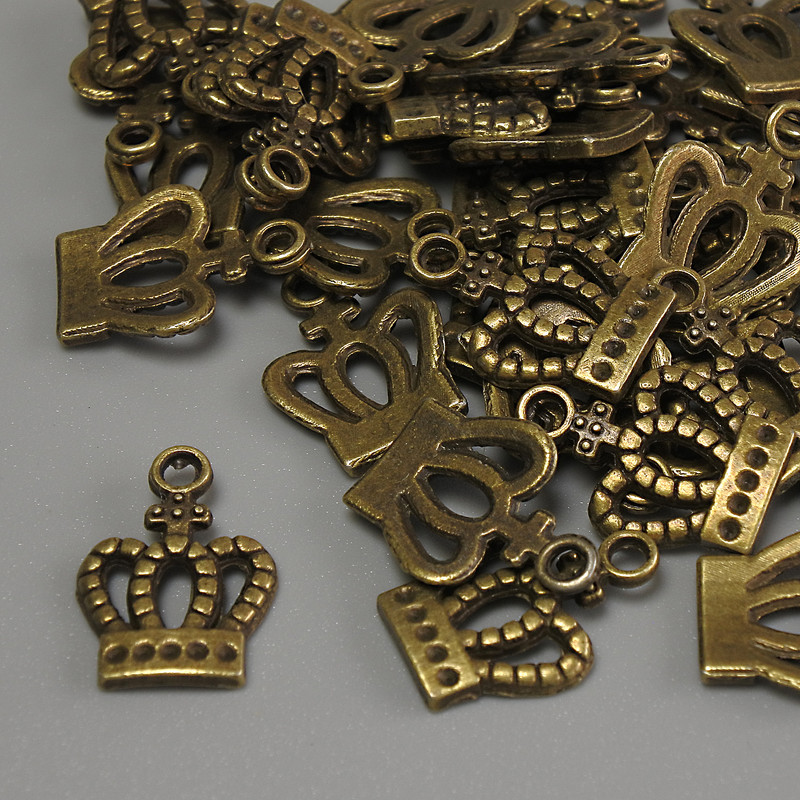 Crown Pendant Findings - Bronze Metal Color, Dimensions 15x10x1 mm ± Hole Diameter 2 mm ± Packaging 20 g (~36 pcs)