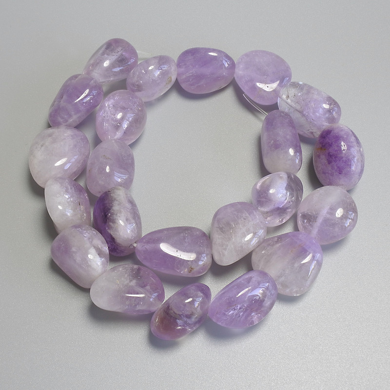 Amethyst faceted beads, diameter 19–21 × 12–19 mm ±, on a thread, length 40 cm+