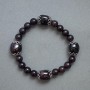 Garnet bead bracelet with metal inserts, 14x12 mm beads, 8 mm beads, length 18 cm (stretch)