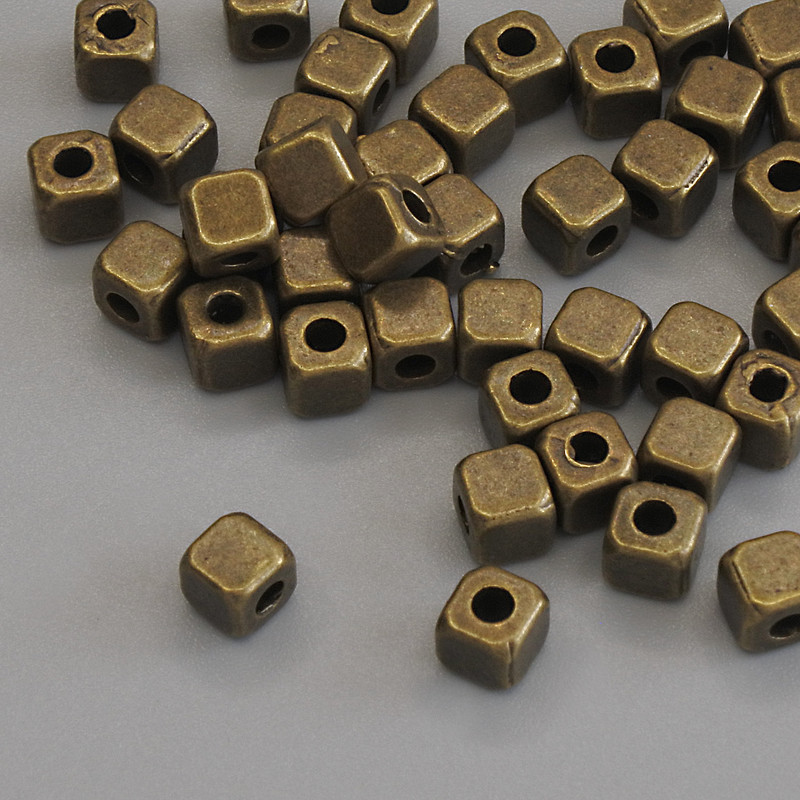 Bronze-colored bead findings, bead inlay, 4x4 mm diameter with approximately 2 mm hole, packaging 42 pcs