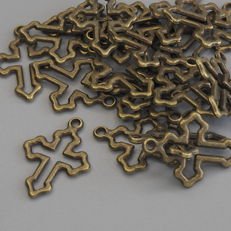 Cross pendant, bronze metal color, diameter 21x15 mm, packaging 23 pcs