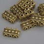 Gold-tone row separator insert, jewelry finding, diameter 14×7×3.5 mm, hole diameter 1.8 mm, packaging 20 g (~13 pcs).