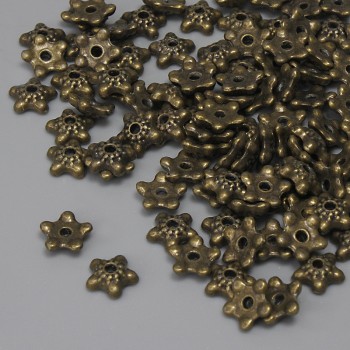 Bead cap findings in antique bronze color, diameter 6×1 mm, hole diameter about 1.1 mm, packaging 20 g (~90 pcs)