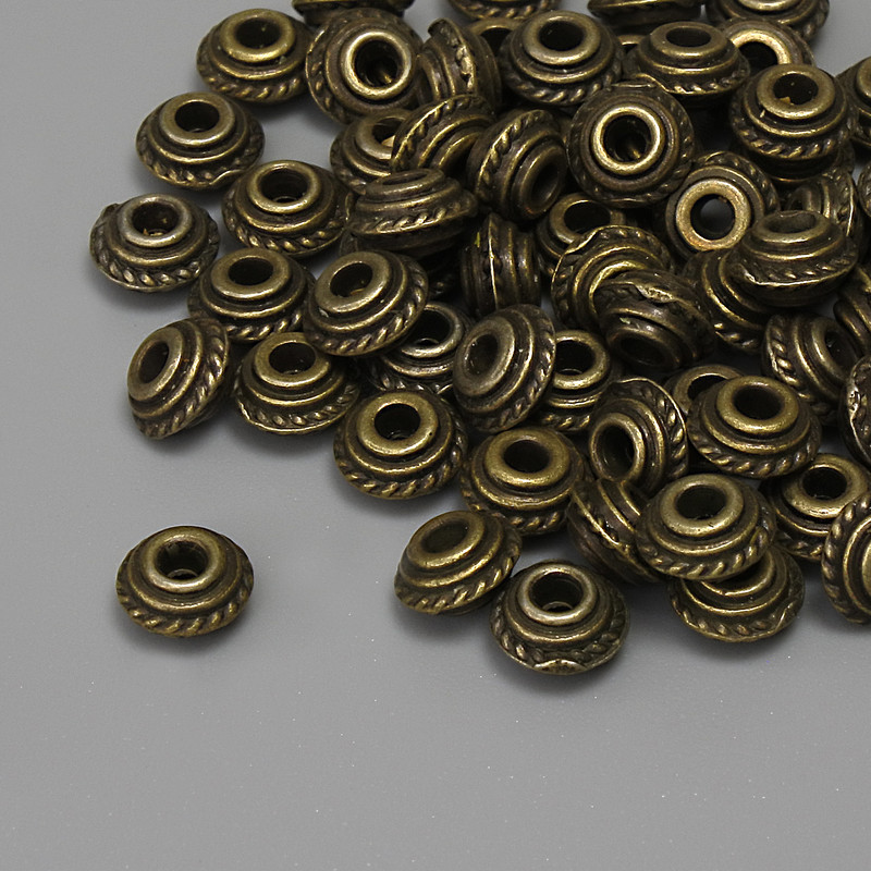 Bronze-colored bead insert findings, diameter 5x3 mm, hole diameter 1.5 mm, packaging 63 pcs