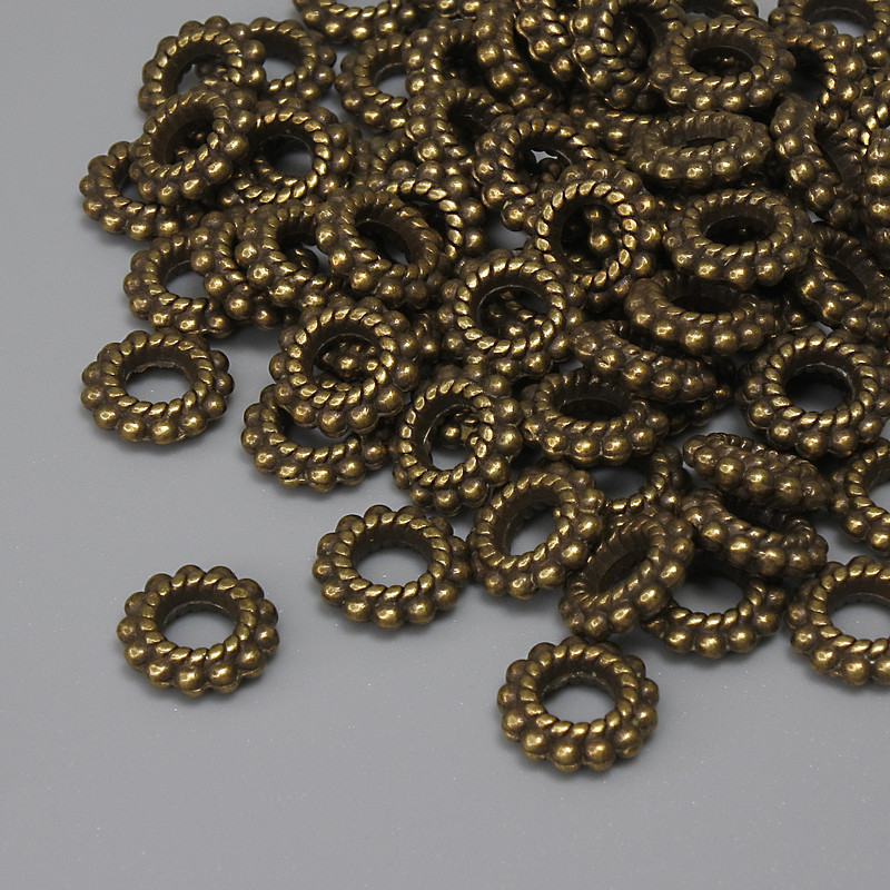 Bronze-colored bead-insert finding, 8×2 mm with a 3.5 mm hole, packaging 72 pcs