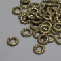 Bronze-colored bead insert findings, 7.5×2 mm, hole diameter approximately 3.7 mm, packaging 44 pcs.