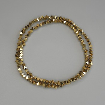 Hematite beads, gold-colored cubes with a through hole, 2x2 mm, on thread, length 38 cm+