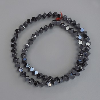Hematite cube beads with through hole 4x4 mm ± on beading thread, length 40 cm+