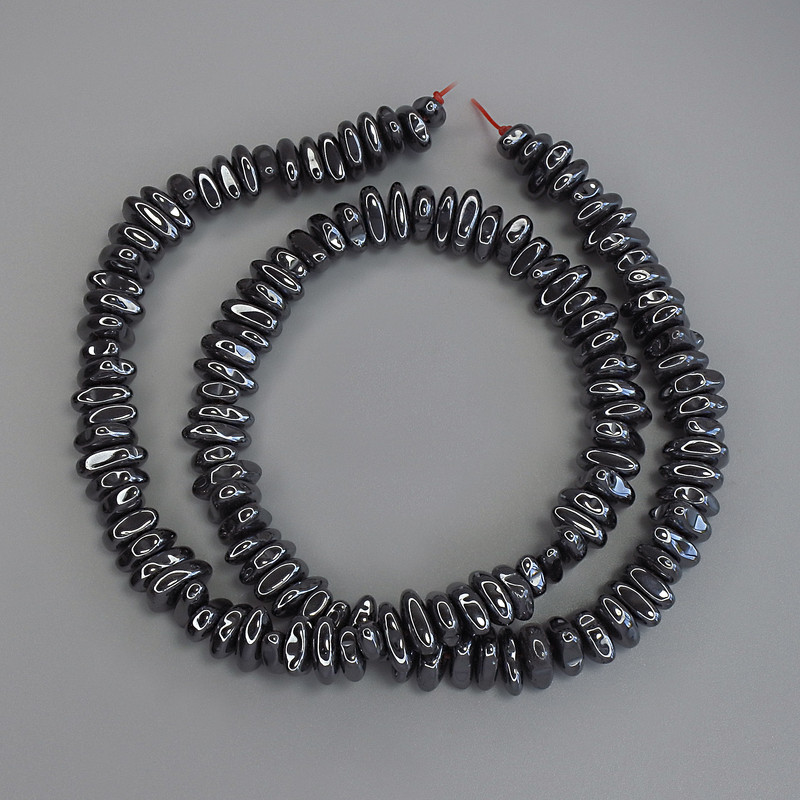 Hematite tumbled beads, 6-7 mm, 5×4 mm ± on thread, length 40 cm
