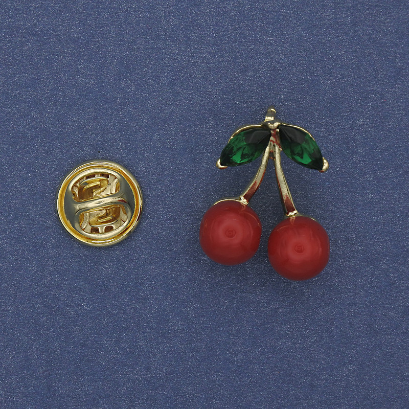 Brooch 'Cherries' red and green enamel on golden metal 20x16 mm+