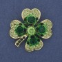 Clover brooch pendant with green crystals, gold-toned metal, diameter 35mm +