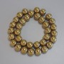 Gold-colored hematite beads, smooth round 12mm ± on a thread, length about 40 cm ±